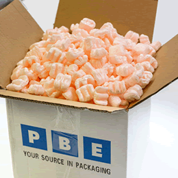 A PBE-branded carton filled to the top with pink loose fill.