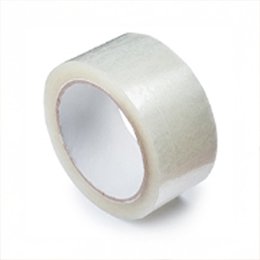 A roll of clear carton-sealing tape standing on its side, its white core facing the camera.